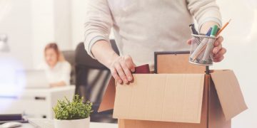 A dismissed employee gathering things and leaving the premises after constructive dismissal proceedings