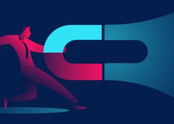 A person holding a magnet as a symbol for generating business leads