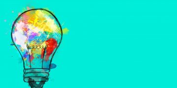 A light bulb with many colours as a symbol for creativity