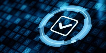 A tick on a background of computer code as a symbol of cyber security certifications