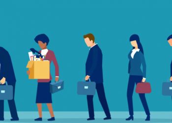 A series of fired employees leaving work, as an example of what redundancy means