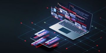 A computer with a visual representation of the coding and work that goes into building proprietary software