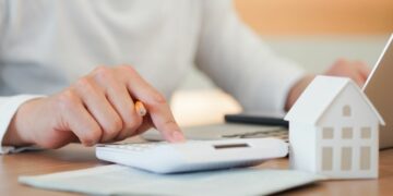 A landlord calculating the amount of rent insure