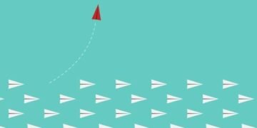 Papers planes flying with one diverting up, showing how a changed strategy for the new normal can help businesses grow