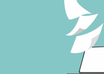 Paper flying out of a laptop