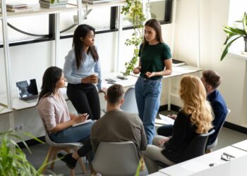 A team of people having meeting to solve a workplace problem