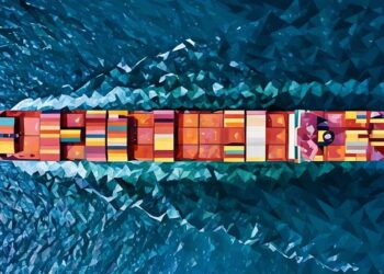 Cargo ship travelling over water symbolising import and export