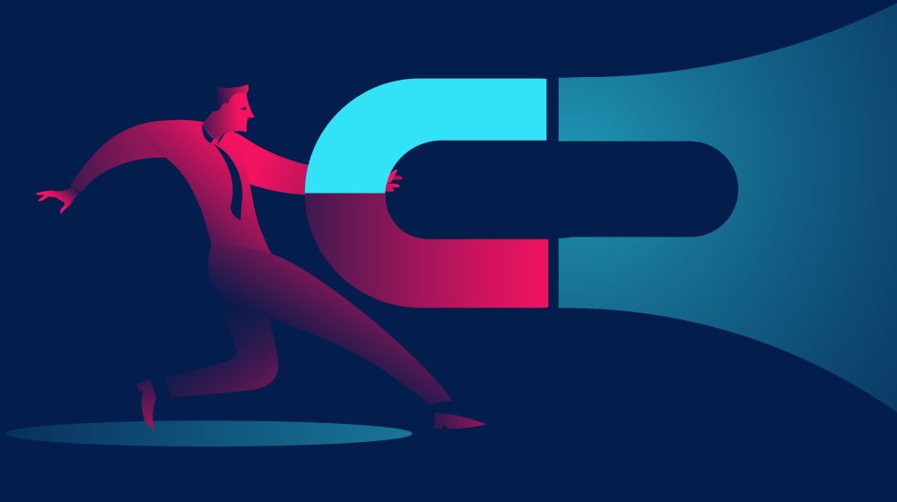 Man with magnets symbolising attracting leads