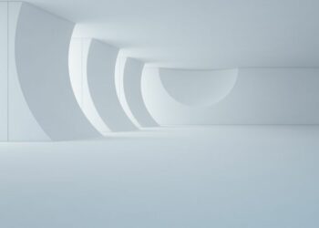 A white curved wall office space depicting a sense of what future office environments might look like