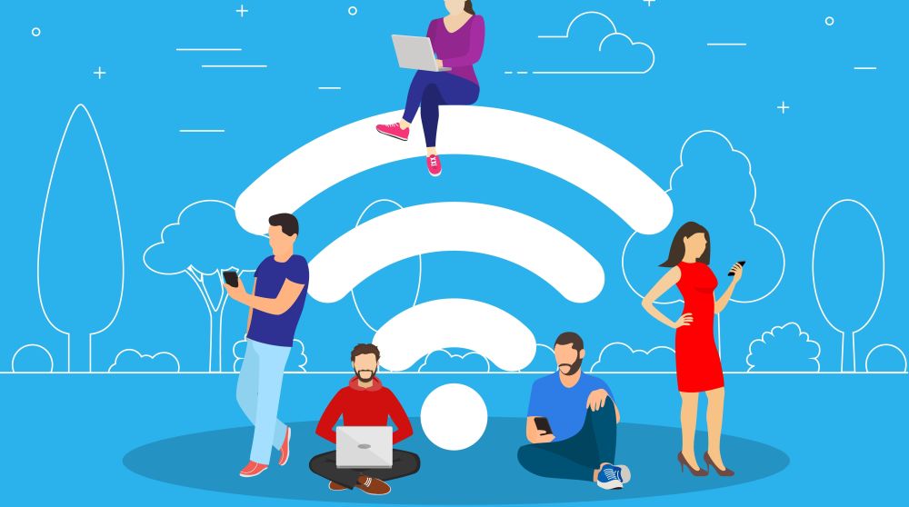 A group of people sitting around a wifi symbol getting good reception