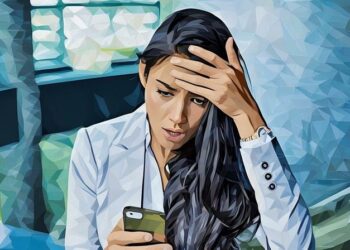 A team member staring at their phone in disbelief realising they've lost a client