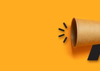 A speaker emitting noise as a on the nose symbol of how marketing strategies work