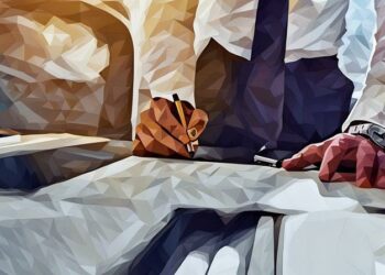 Investor signing an angel investment contract, closing a deal with an entrepreneur to buy shares in his company