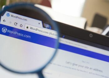 A magnifying glass enlarging the name of the website named Wordpress.