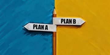 A pencil with the labels plan a and plan b going different directions