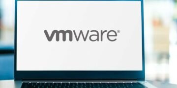An open laptop with VMWare running showing the logo