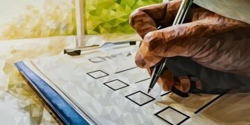 A checklist being checked by a pen
