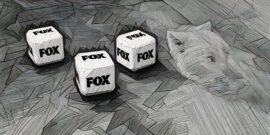 A series of dice with Fox News on them