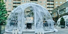 A gazebo tent in a business district used for marketing new products and services
