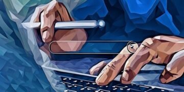 A person typing into search on their computer